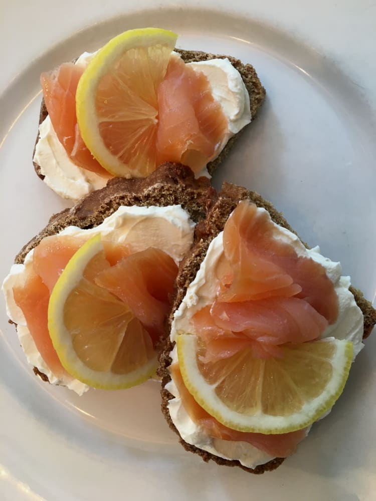 Rye and caraway soda bread served with smoked salmon and cream cheese arranged on a plate Rye and caraway soda bread served with smoked salmon and cream cheese arranged on a plate