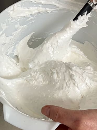 Dried coconut mixed into the meringue.
