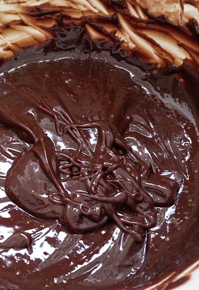 Smooth chocolate, chilli and cream mixture in a bowl