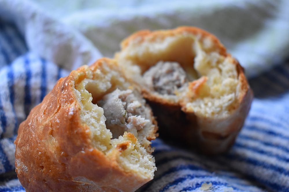 Scone Dog cut in half showing the sausages