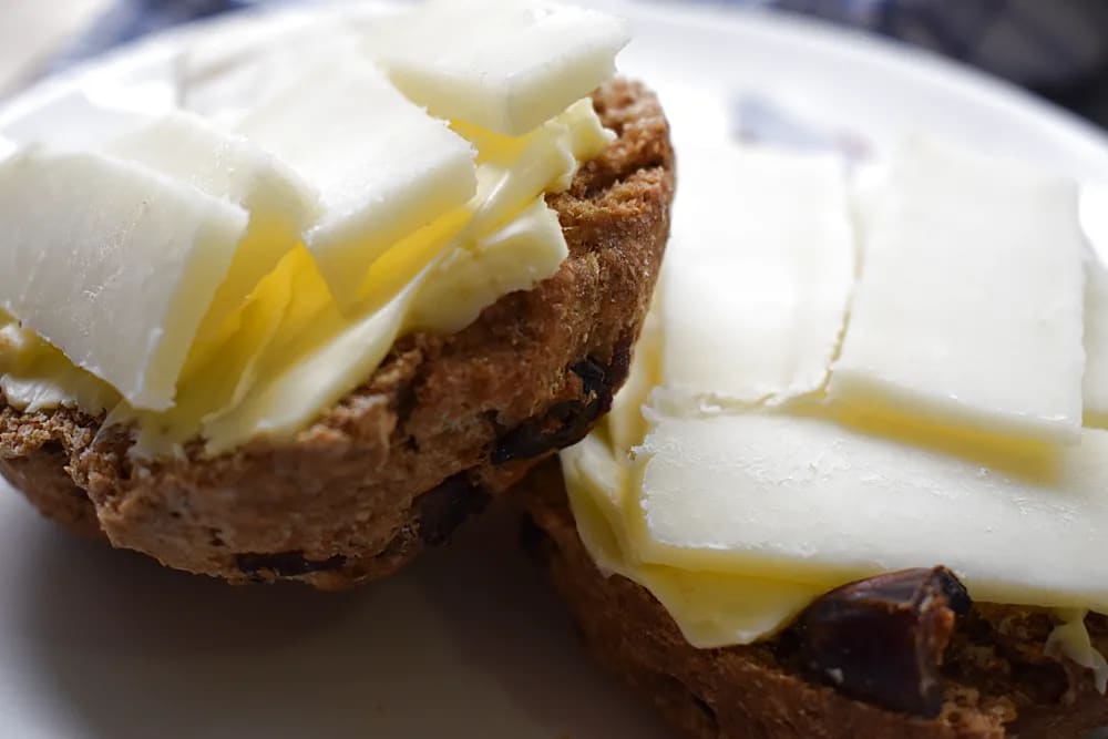 Date Scone cut in half with butter and cheese