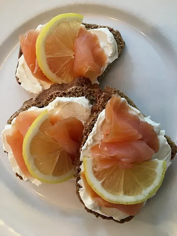 Ancient Grains Bread Rye Soda Bread sliced and served with cream cheese and smoked salmon.