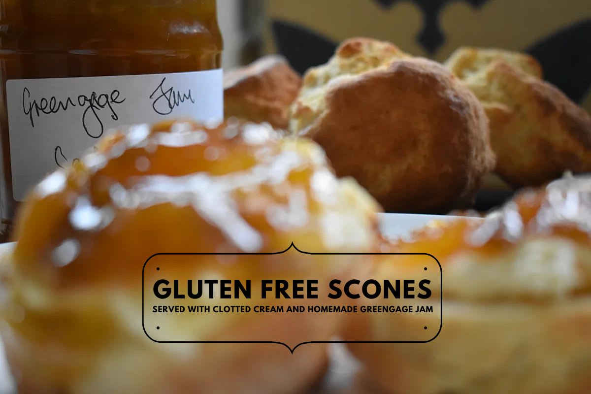 Gluten Free Scones with focus on the greengage jam jar in the background.