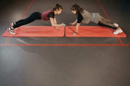 two girls doing arms strengthing exercise/health/punjabmode
