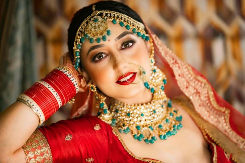 A girl wearing red wedding dress
