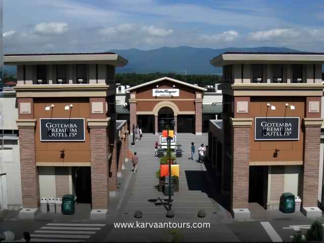 Entrance of Gotemba Premium Outlets with mountain backdrop
