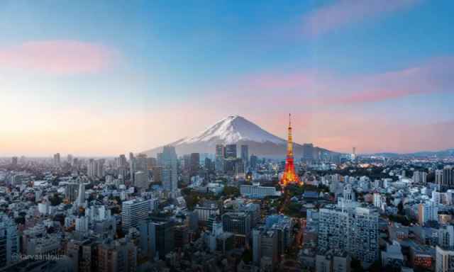 Tokyo skyline with Tokyo Tower and Mount Fuji at sunset in Japan