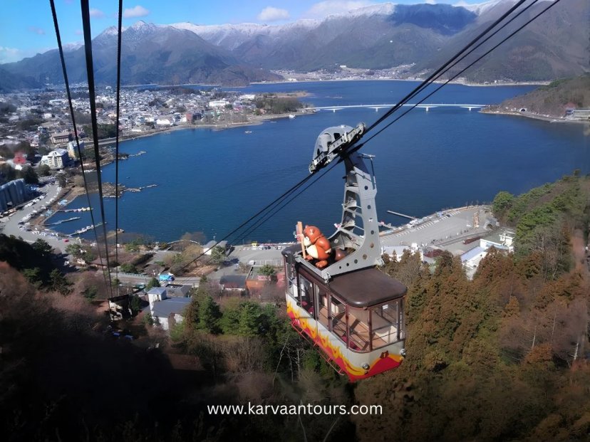 Ropeway cable car over Lake Kawaguchi with mountain views