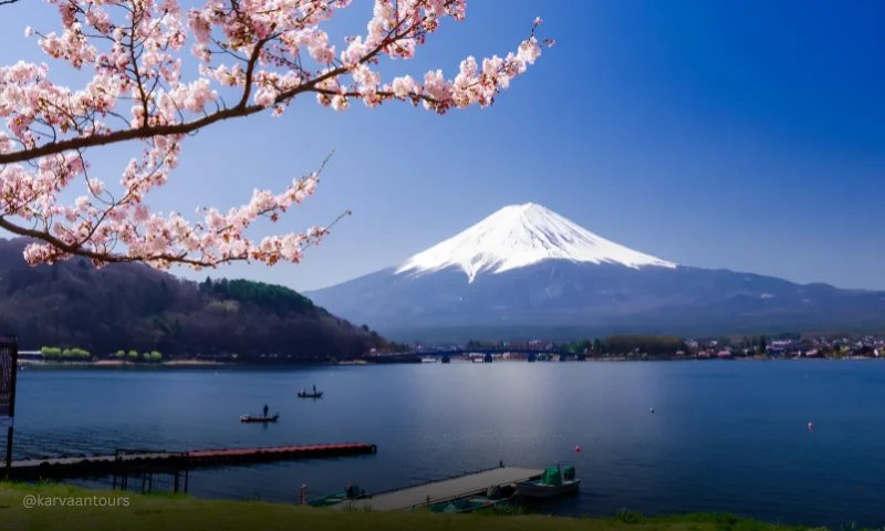 Mount Fuji with cherry blossoms overlooking Lake Kawaguchi in Japan