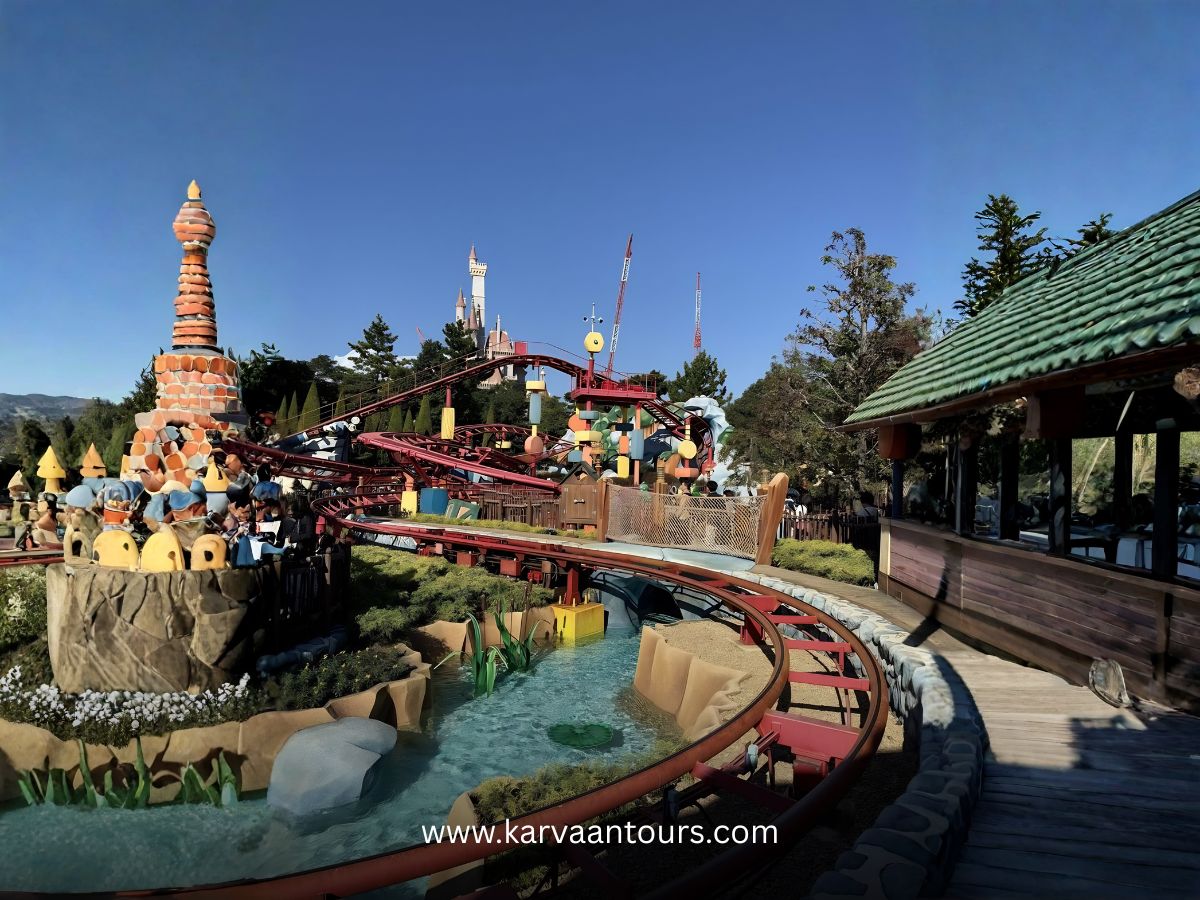 Family-friendly roller coaster winding through the colorful Toontown landscape at Tokyo Disneyland.
