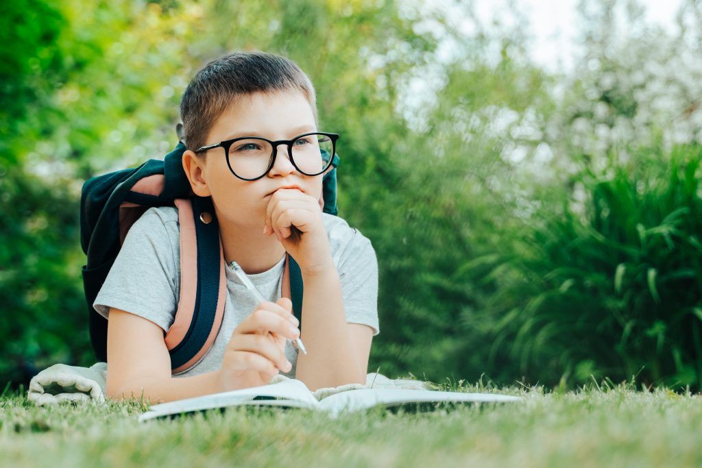 creative-kid-boy-thinking-about-back-to-school-do-53VKGTH-1024x683.jpg