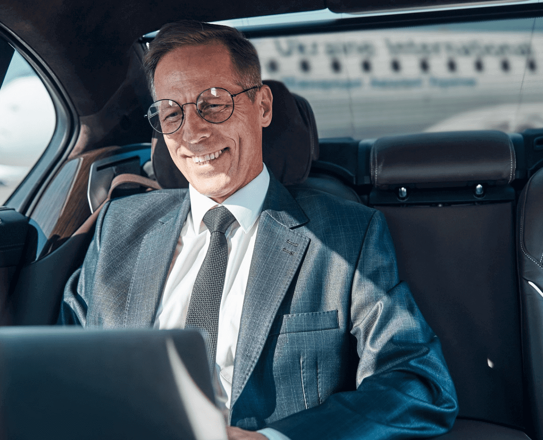 Business passenger travelling comfortably on a private intercity journey