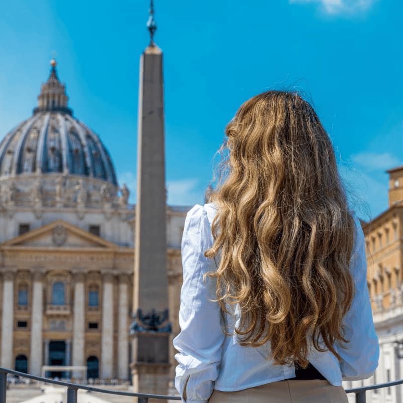Traveller overlooking St Peter's Basilica in Rome