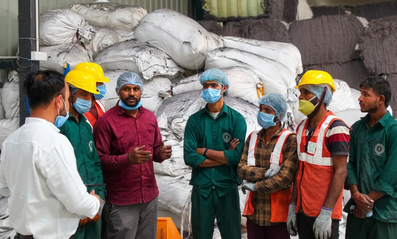 ReSutra team discussing textile recycling operations in Jaipur