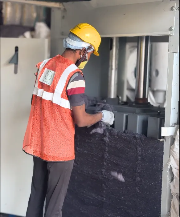 Industrial fiber processing machine at ReSutra textile recycling plant in Jaipur