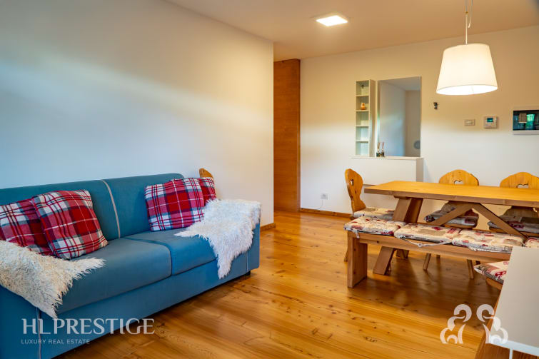 RIf.1645 - Un rifugio esclusivo ai piedi delle Dolomiti: appartamento al piano terra a Cortina d'Ampezzo