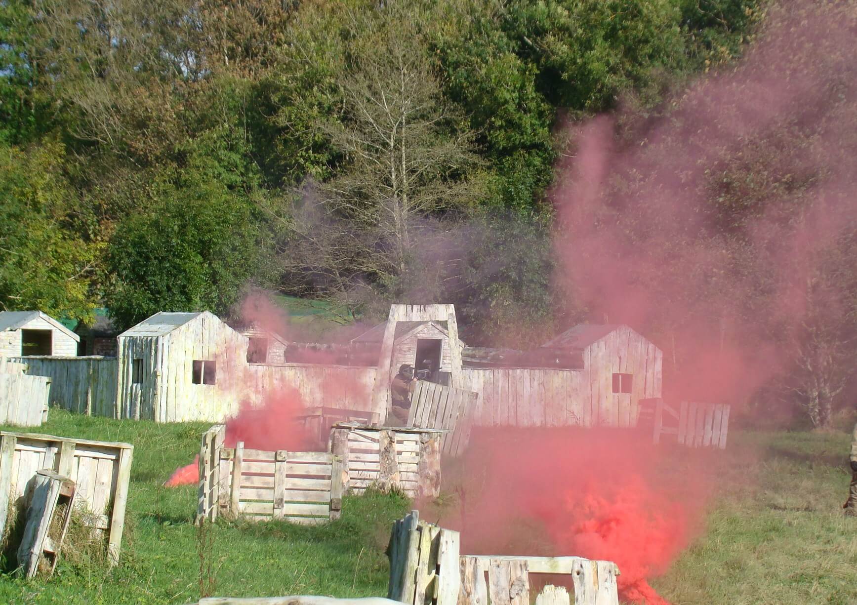 Smoke bombs denonating in the village