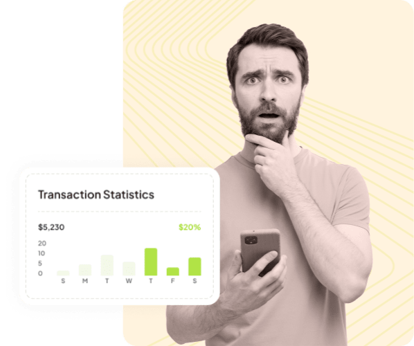A man looking surprised while holding a phone.