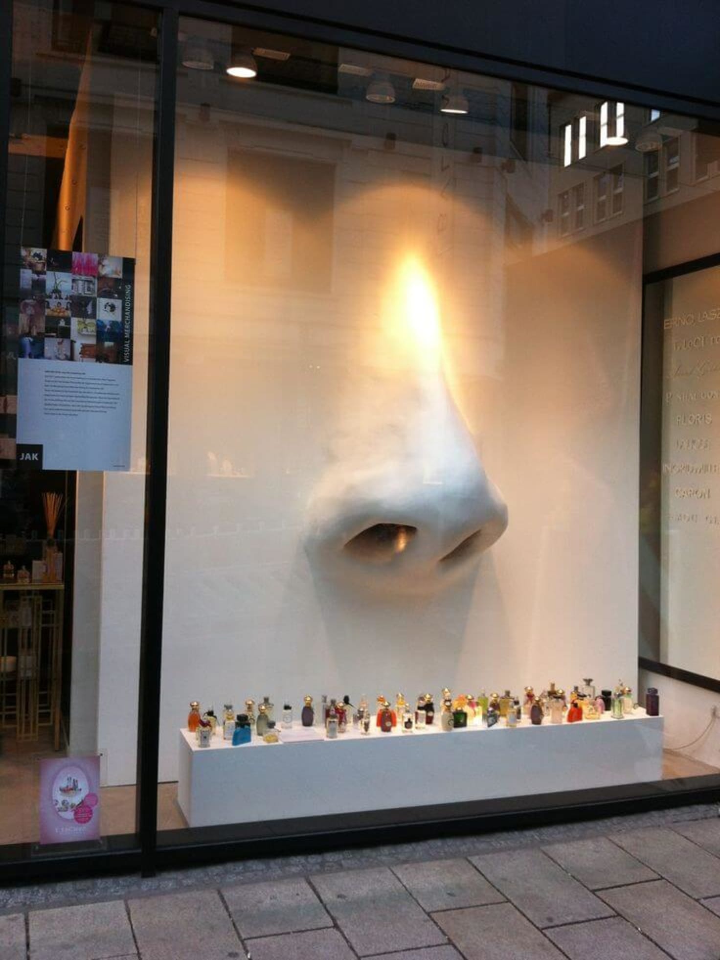 Pictures of creative white windows and Visual Merchandising at the