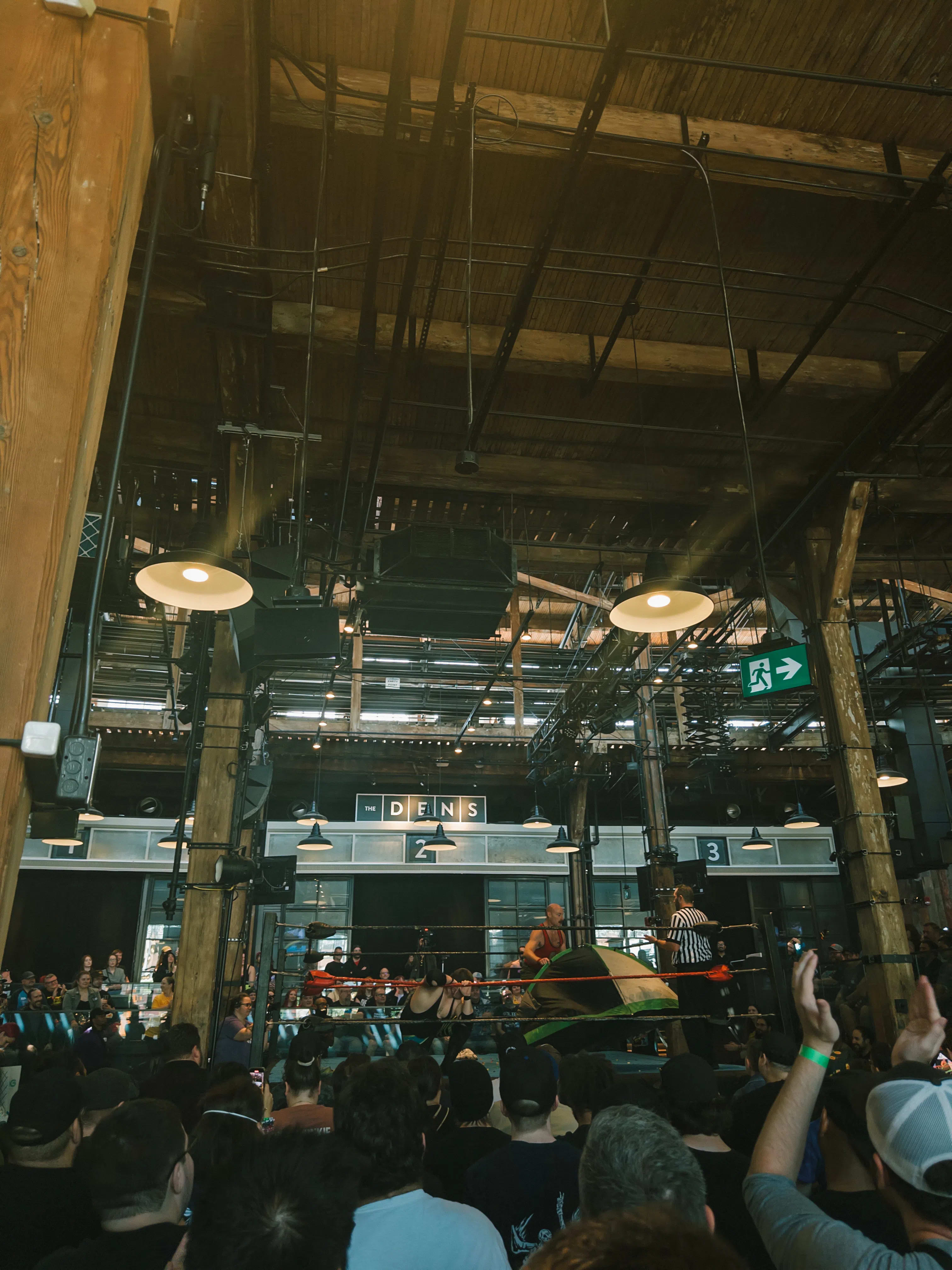 The view from our seats at Mystery Wrestling 18, live from the Rec Room Roundhouse in Toronto. There is a tent in the ring in a match between Cecil Nyx & 'Man Scout' Jake Manning.