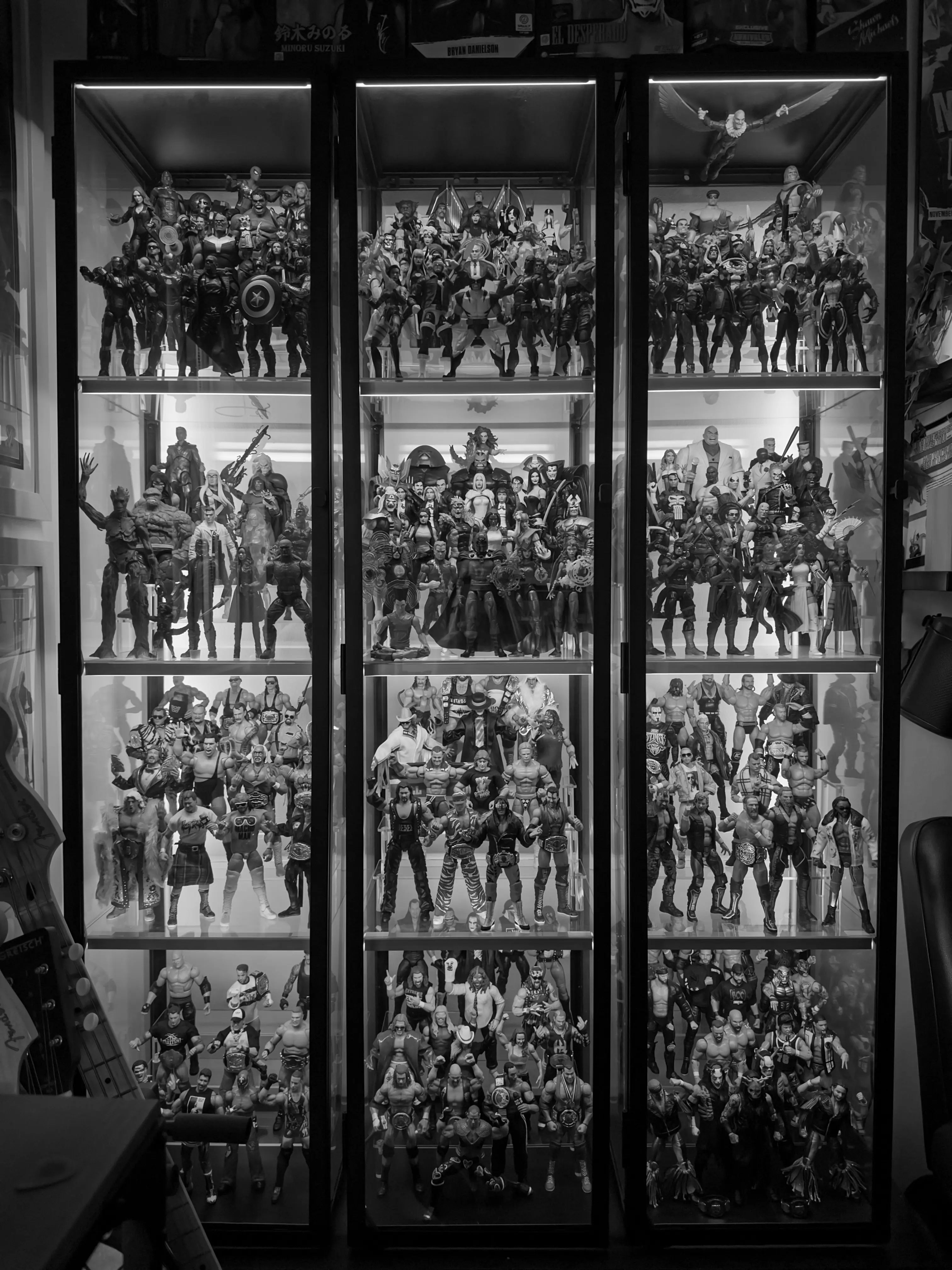 A set of display cabinets filled with action figures I had in the corner of my room.