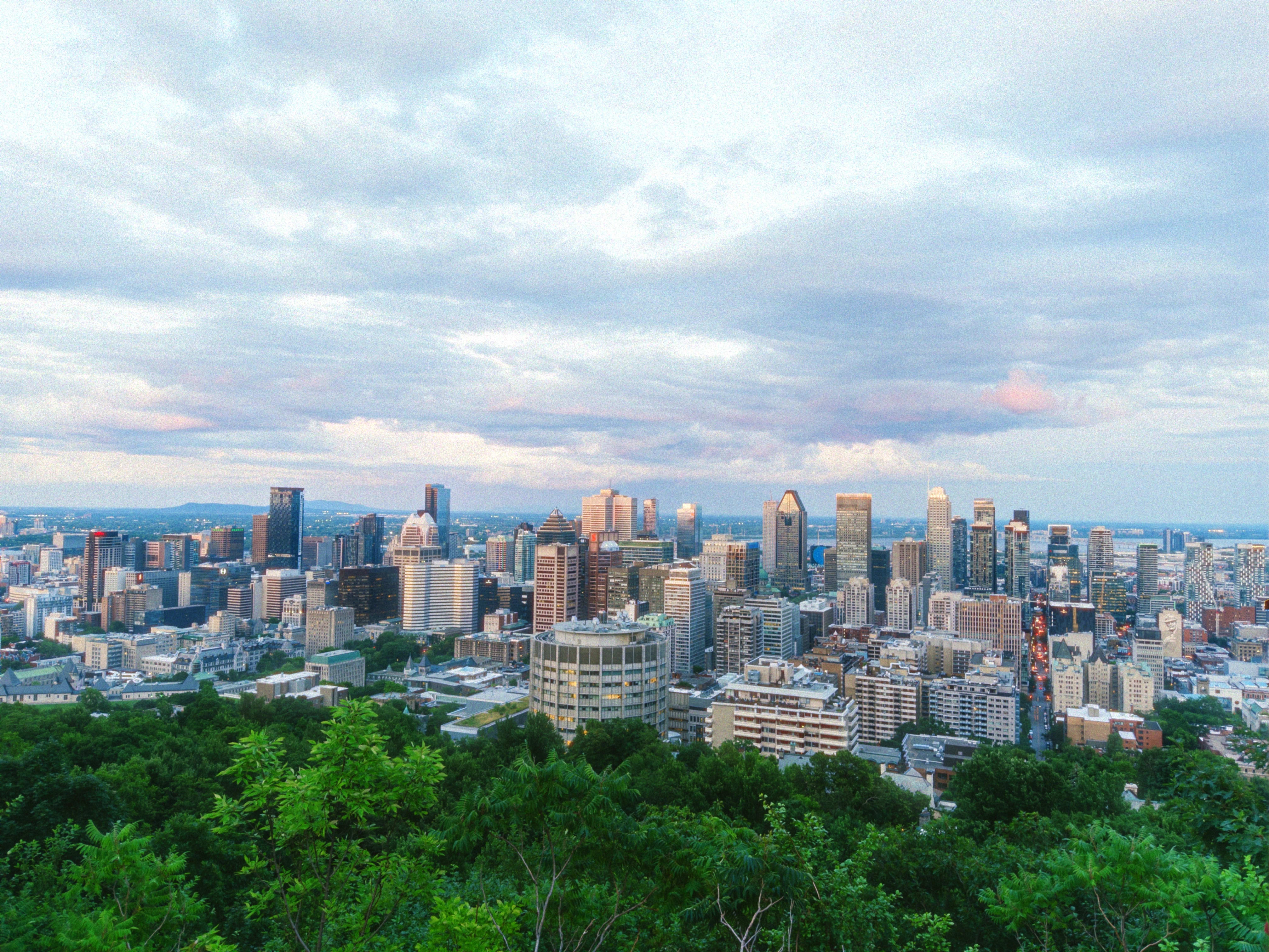 The downtown Montréal skyline from the Kondiaronk Belvedere lookout at sunset.