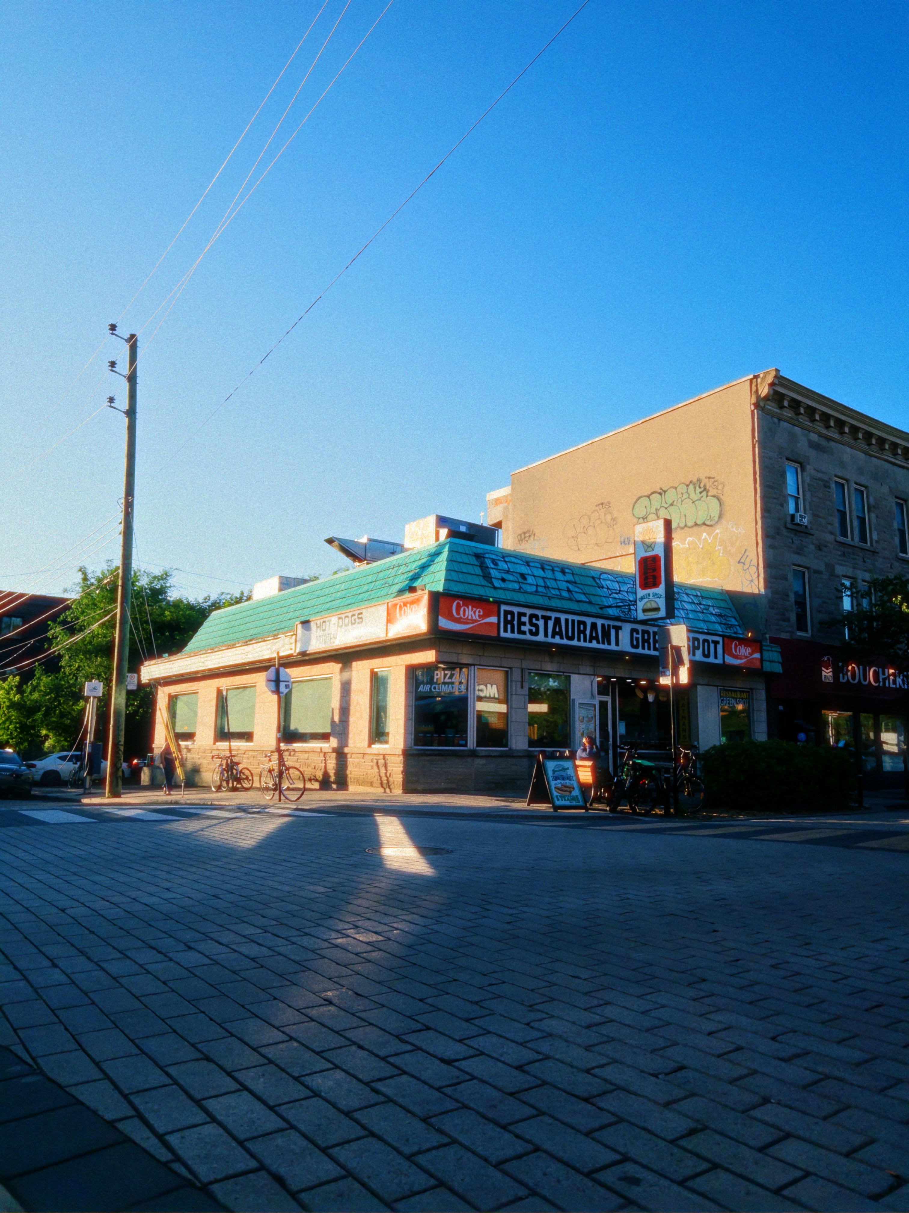 The exterior of the Greenspot Diner at sunset.