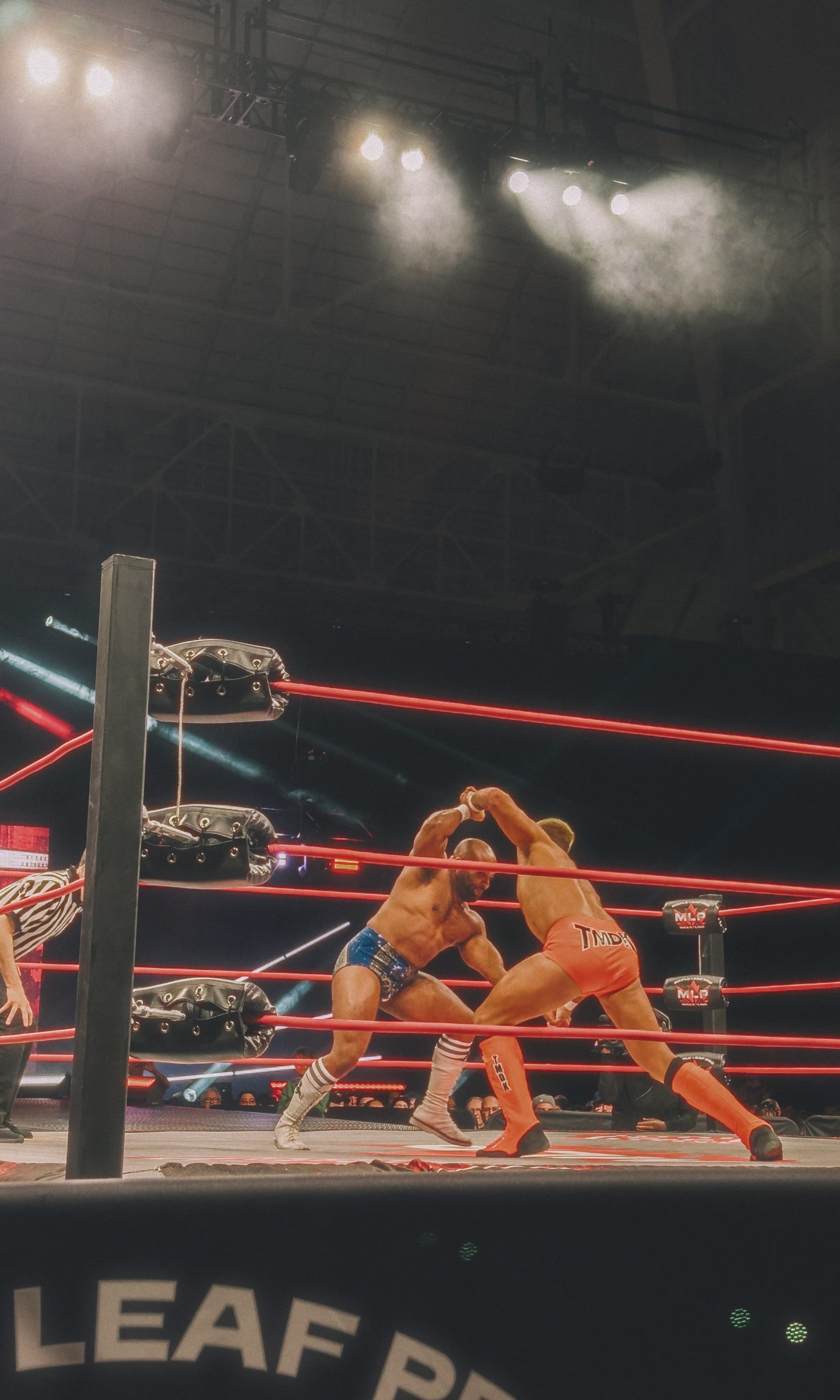 A photo of Zack Sabre Jr. and Jonathan Gresham locking up in the ring at Maple Leaf Pro Wrestling's Northern Rising event in Toronto.