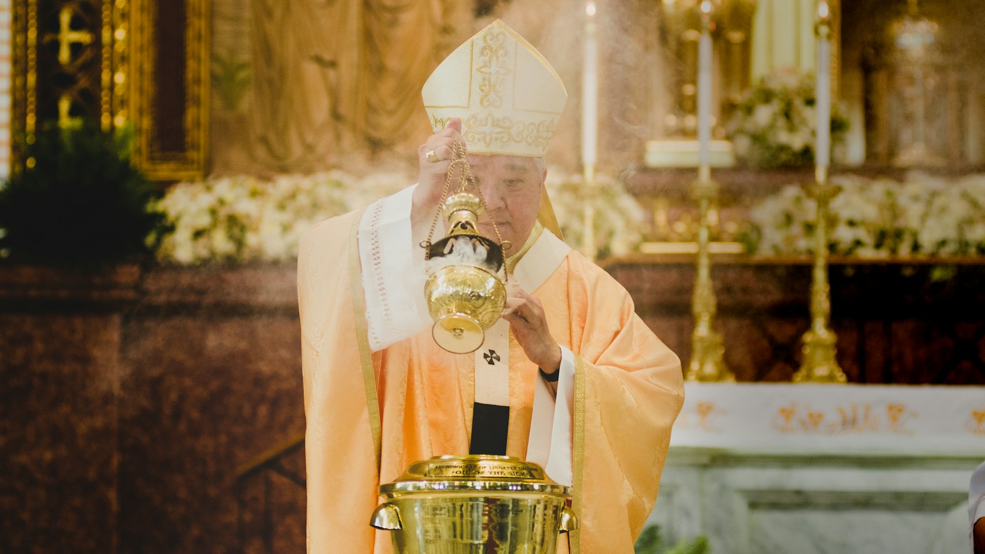 A bishop performing a ritual (by Jomarc Nicolai Cala - Unsplash)