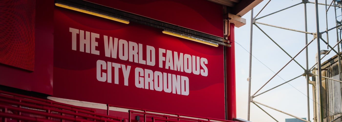 The World Famous City Ground sign above the stand seats