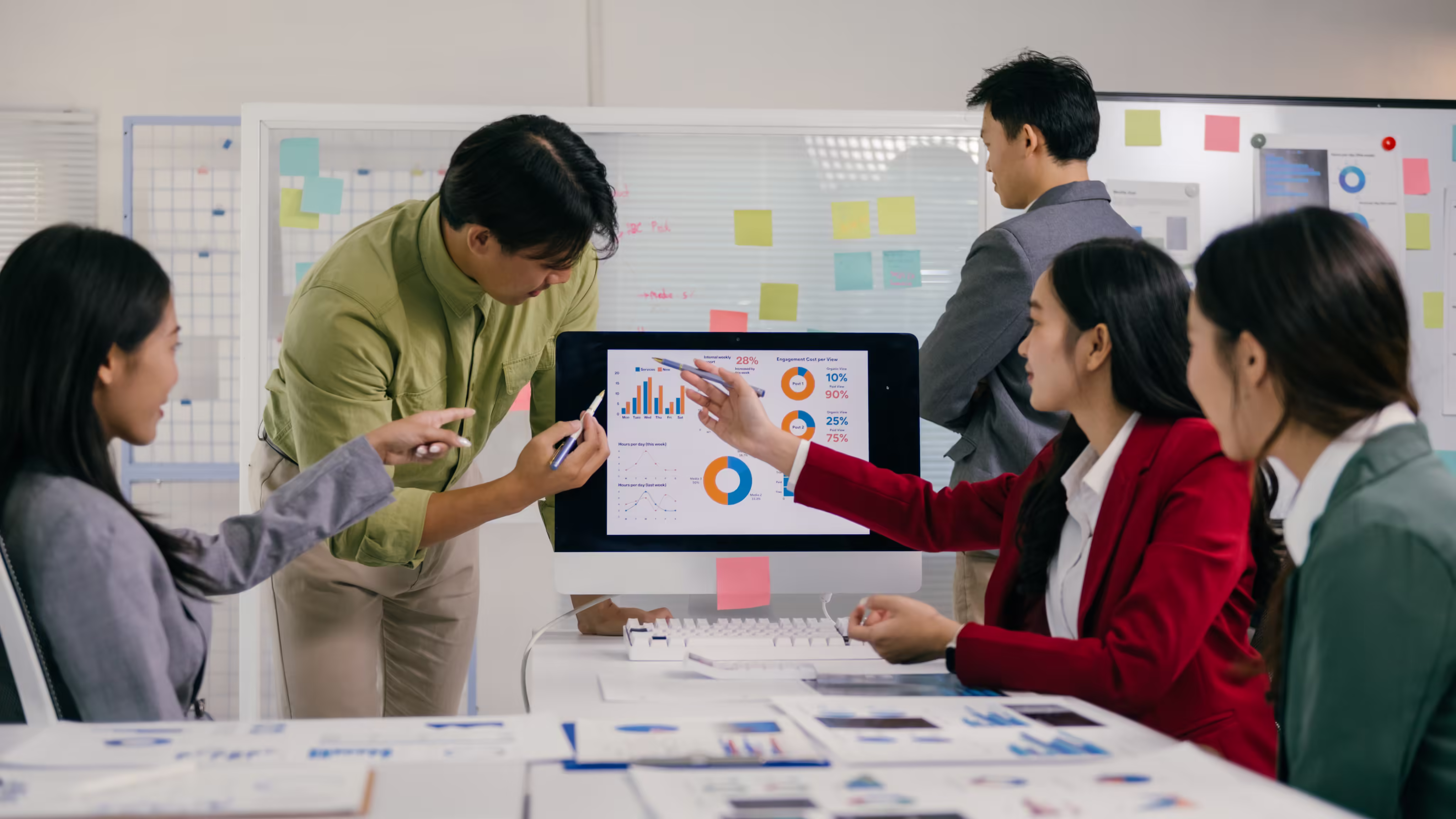 Financial professionals collaborating in modern office