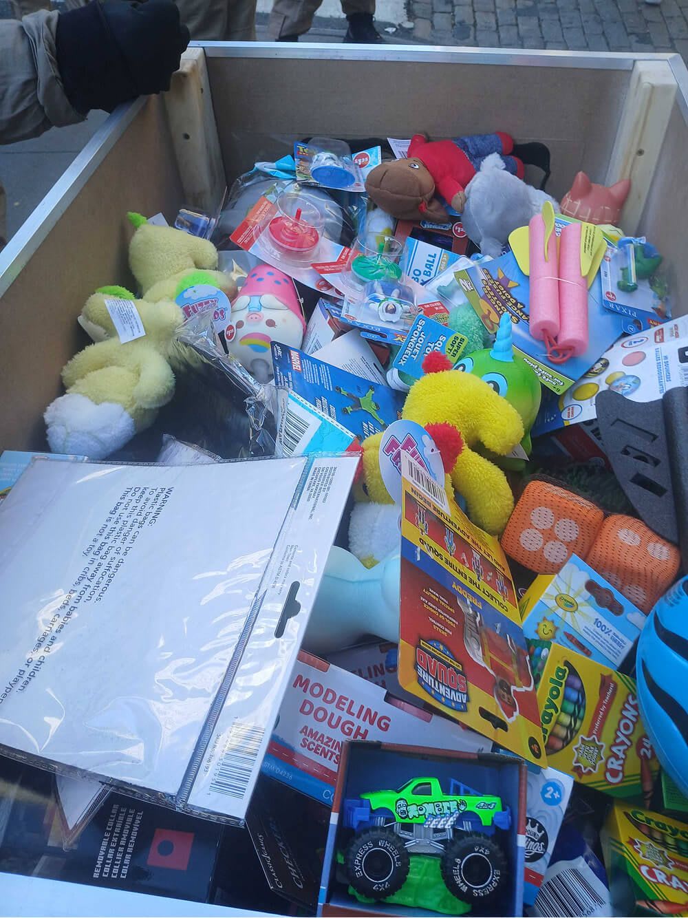 A pile of toys collected by the New York City Ghostbusters and donated to the South Bronx Toy Drive