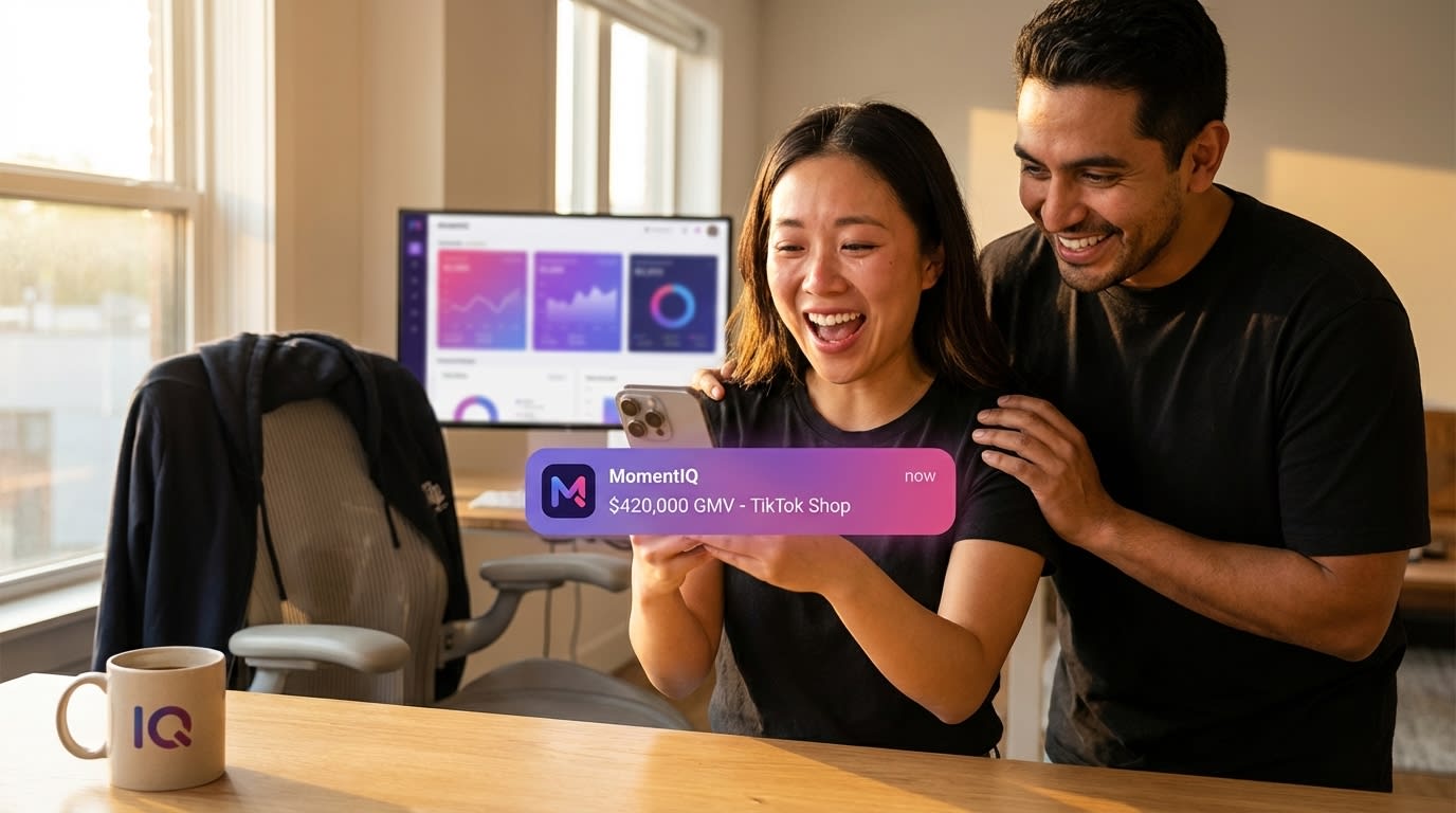 Brand manager celebrating $420K TikTok Shop revenue notification with a teammate