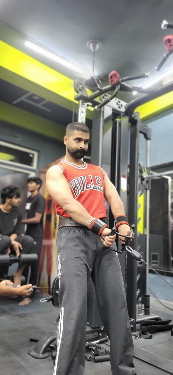 Neeraj Panchal training on the cable machine — Neeraj Fitness Coach