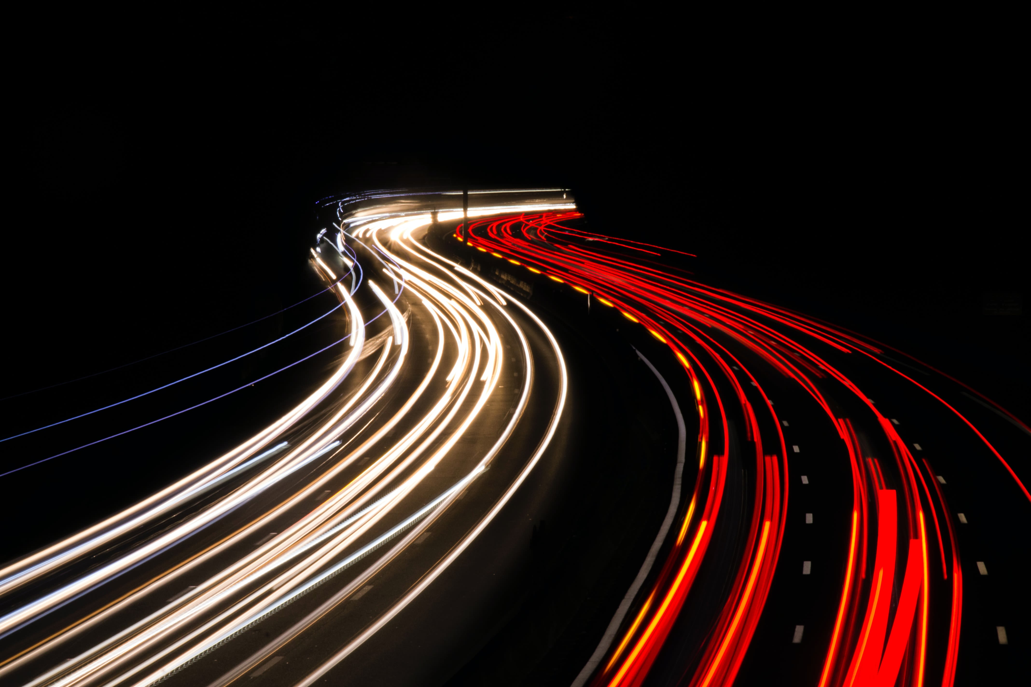 colorful lines created by car tail lights