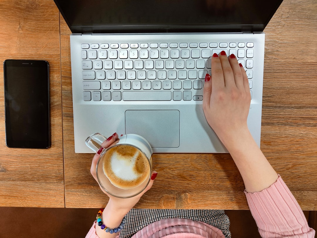 woman typing keyboard beautiful nails