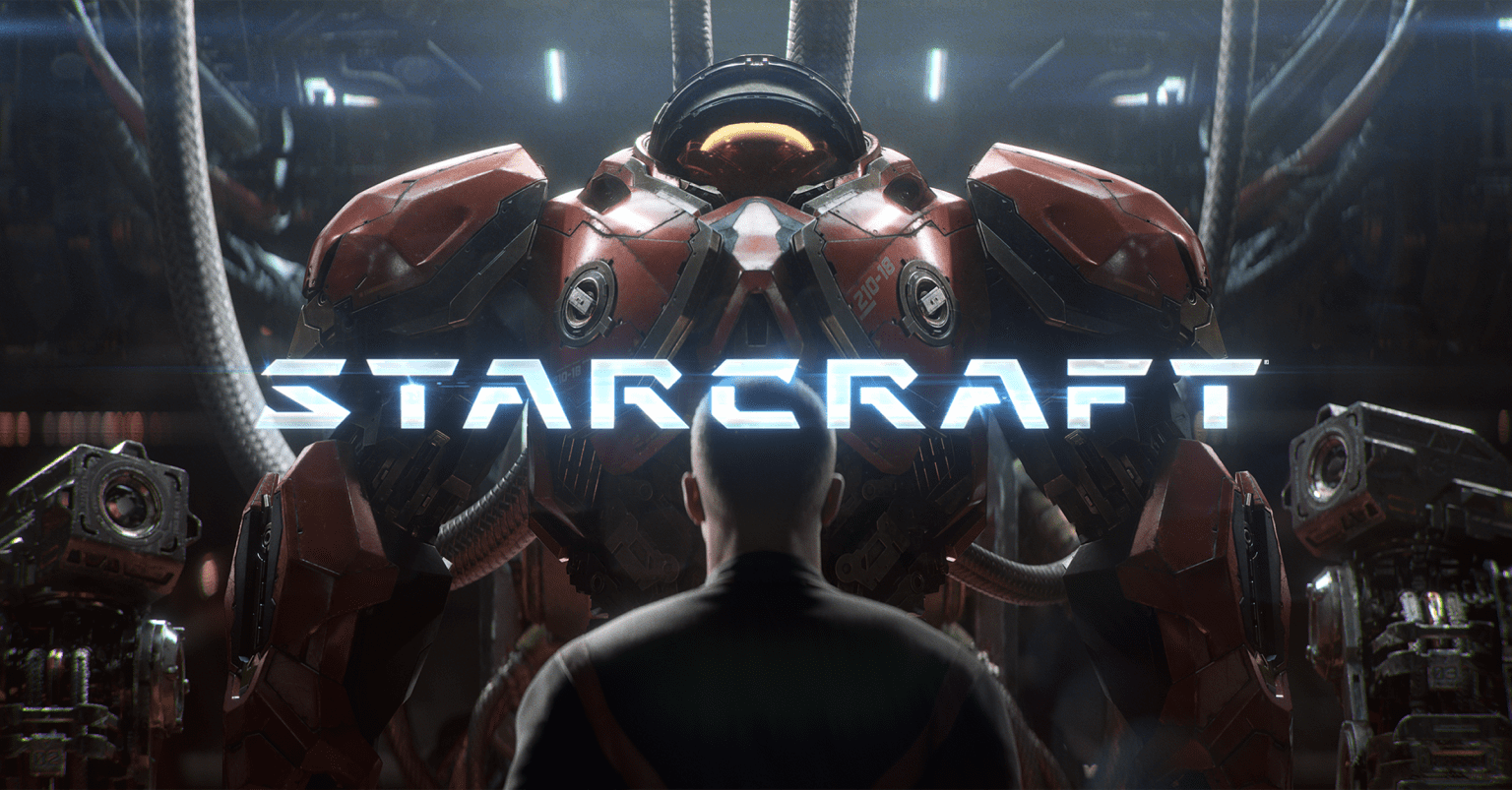 Logotipo de StarCraft sobre a imagem de um homem de costas diante de uma enorme armadura de combate vermelha, cercada de cabos