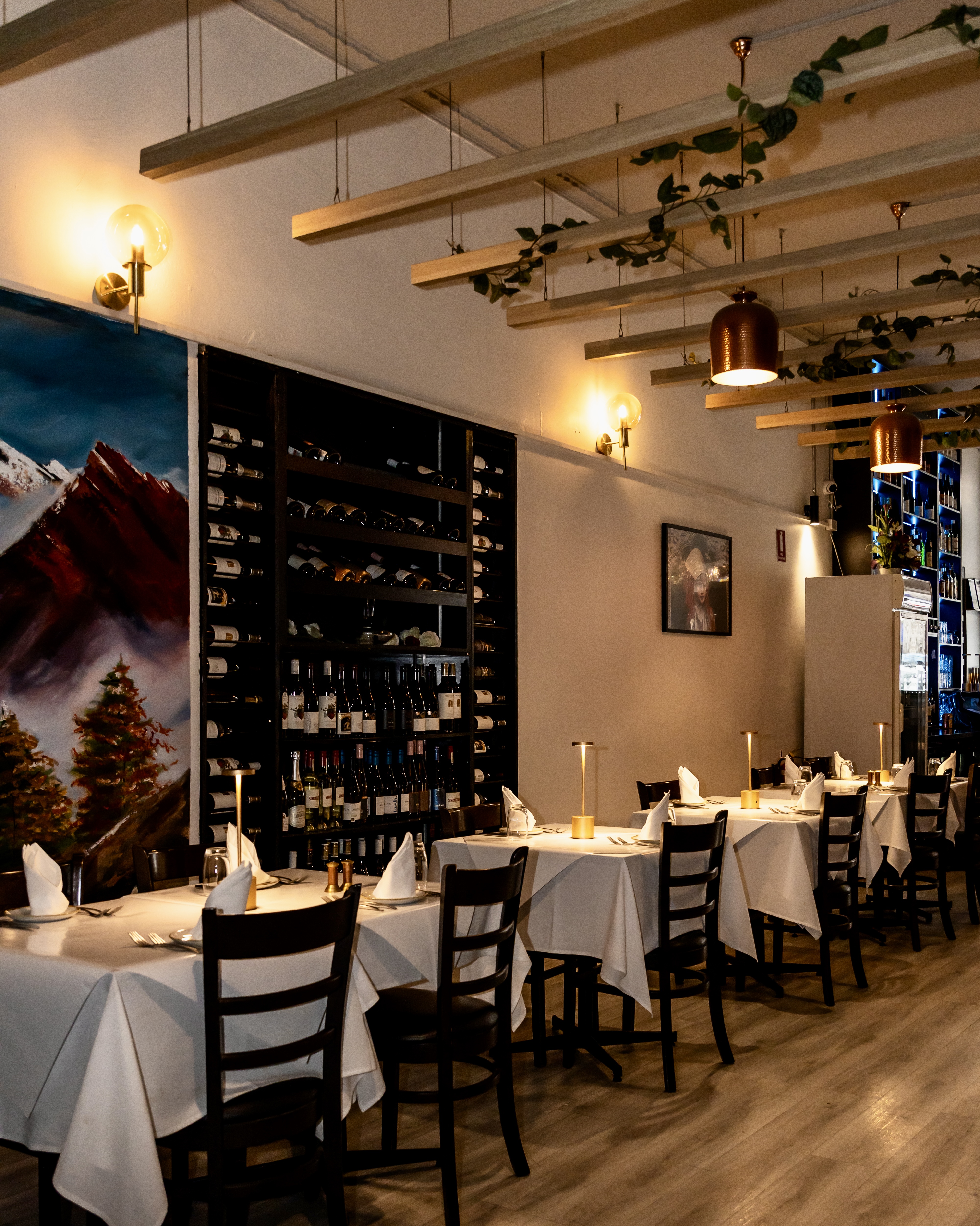 Aagaman restaurant interior — warm, candlelit, earthy ambience