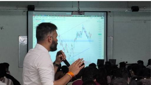 Rahuul R Patel presenting a live chart to the class