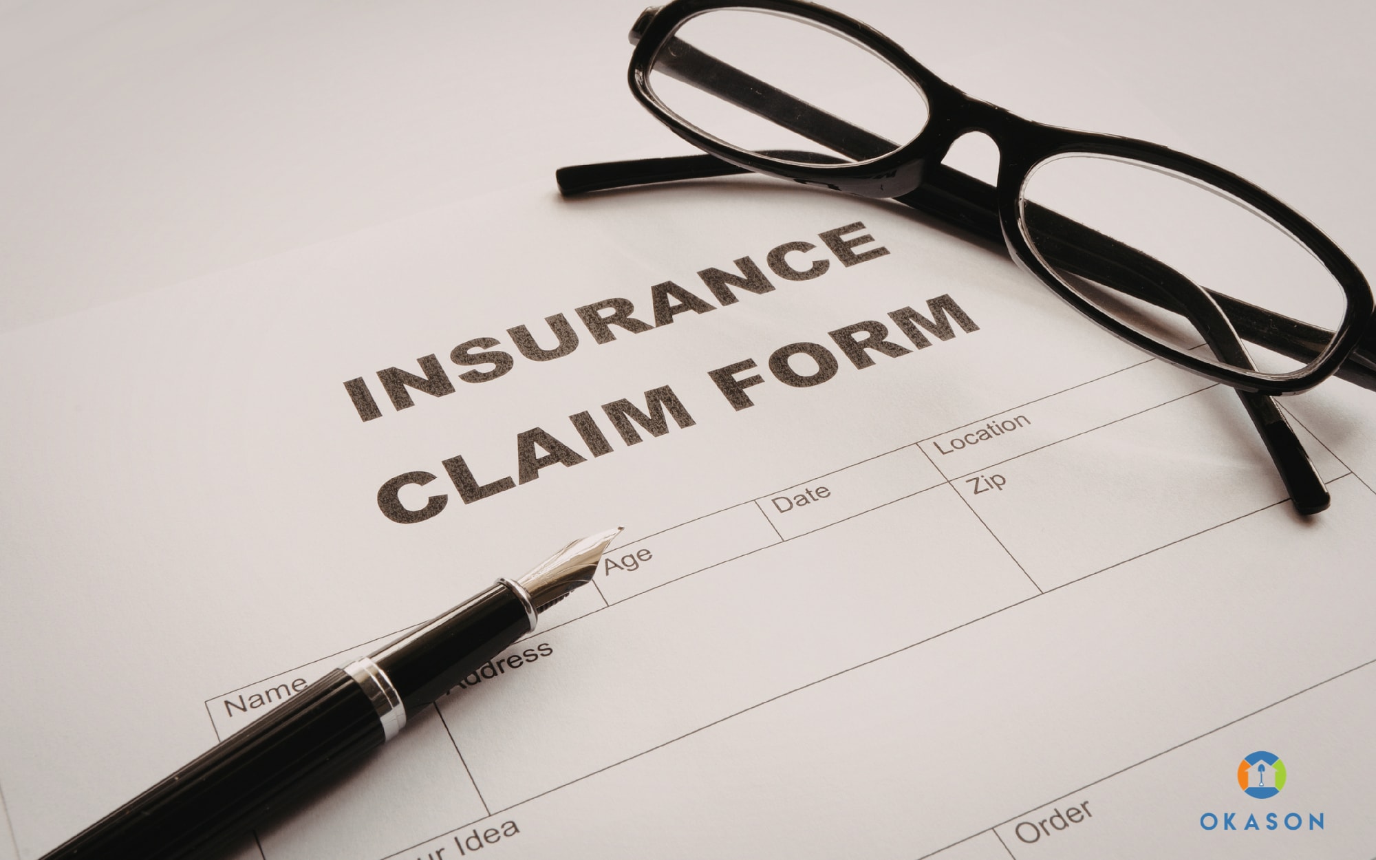 Landscaping crew leader reviewing insurance documents beside a work truck with equipment, representing landscaping business insurance requirements