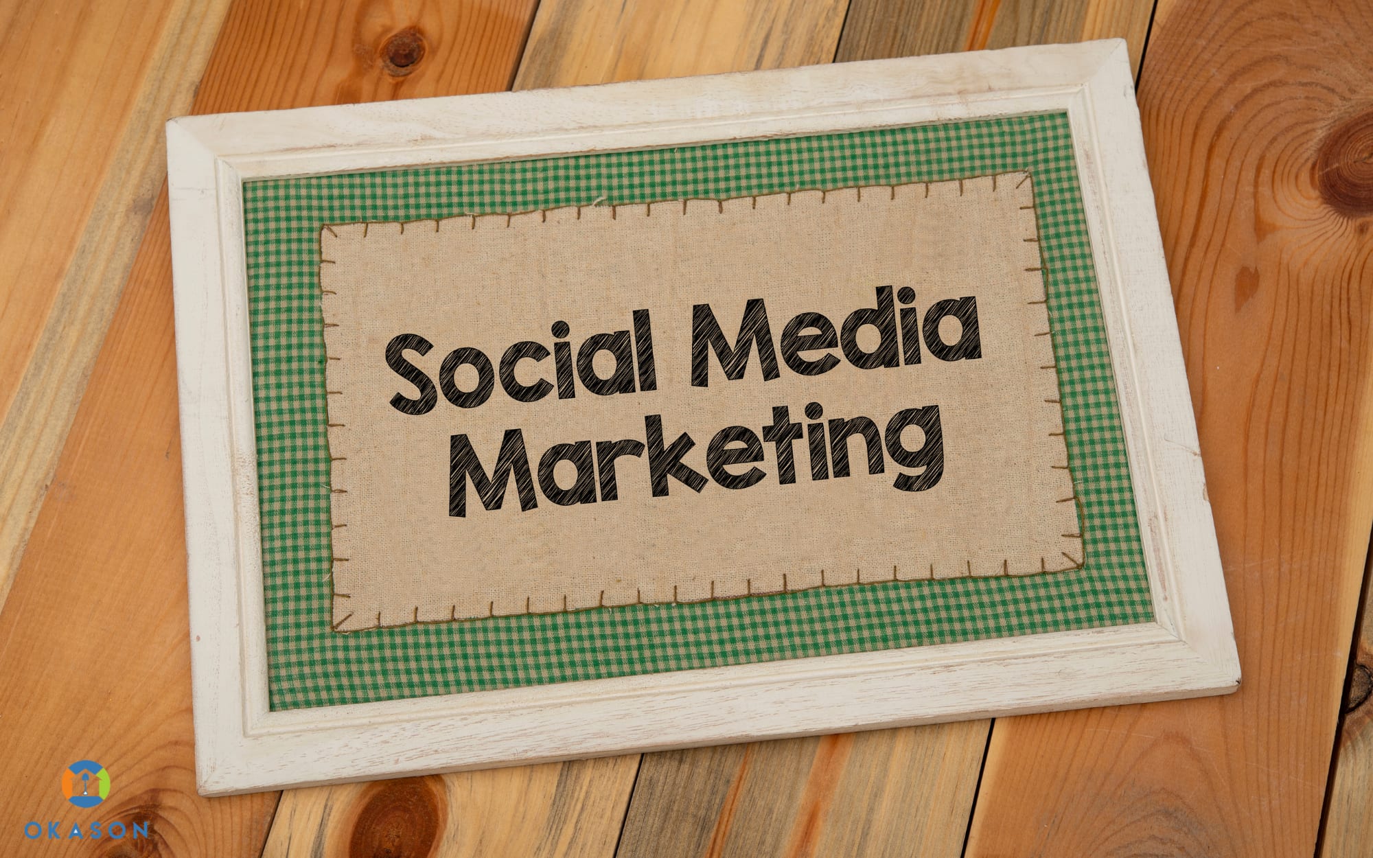 Landscaping contractor shaking hands with a homeowner in front of a freshly mowed and trimmed suburban lawn