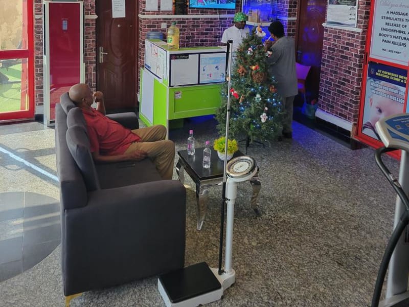 Physiotherapist assisting a patient