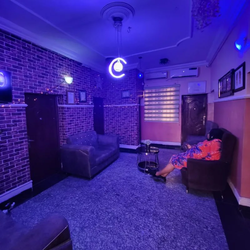 A resident sitting at the living room