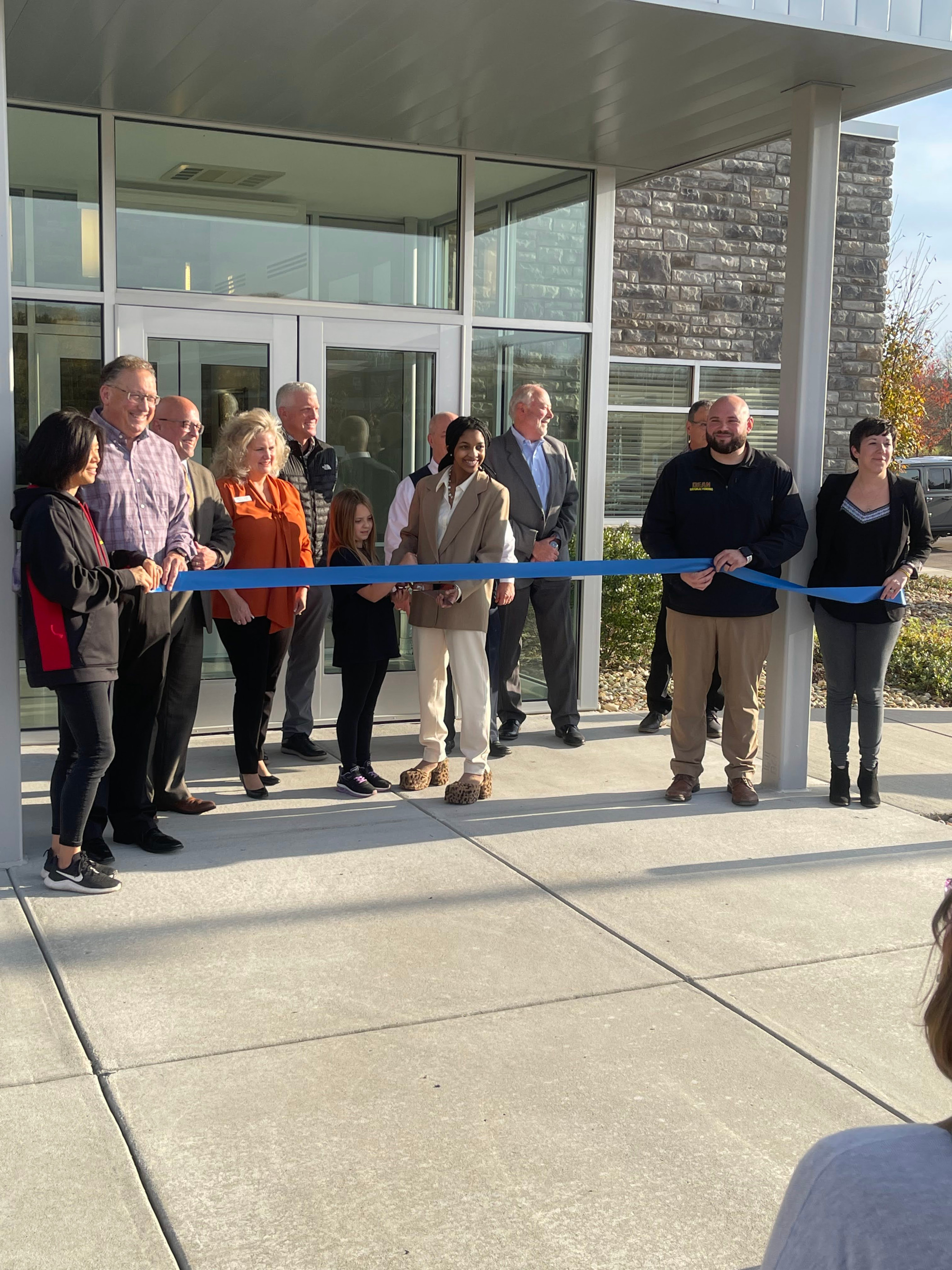 Amplifying Financial Success - the ribbon cutting of a local business