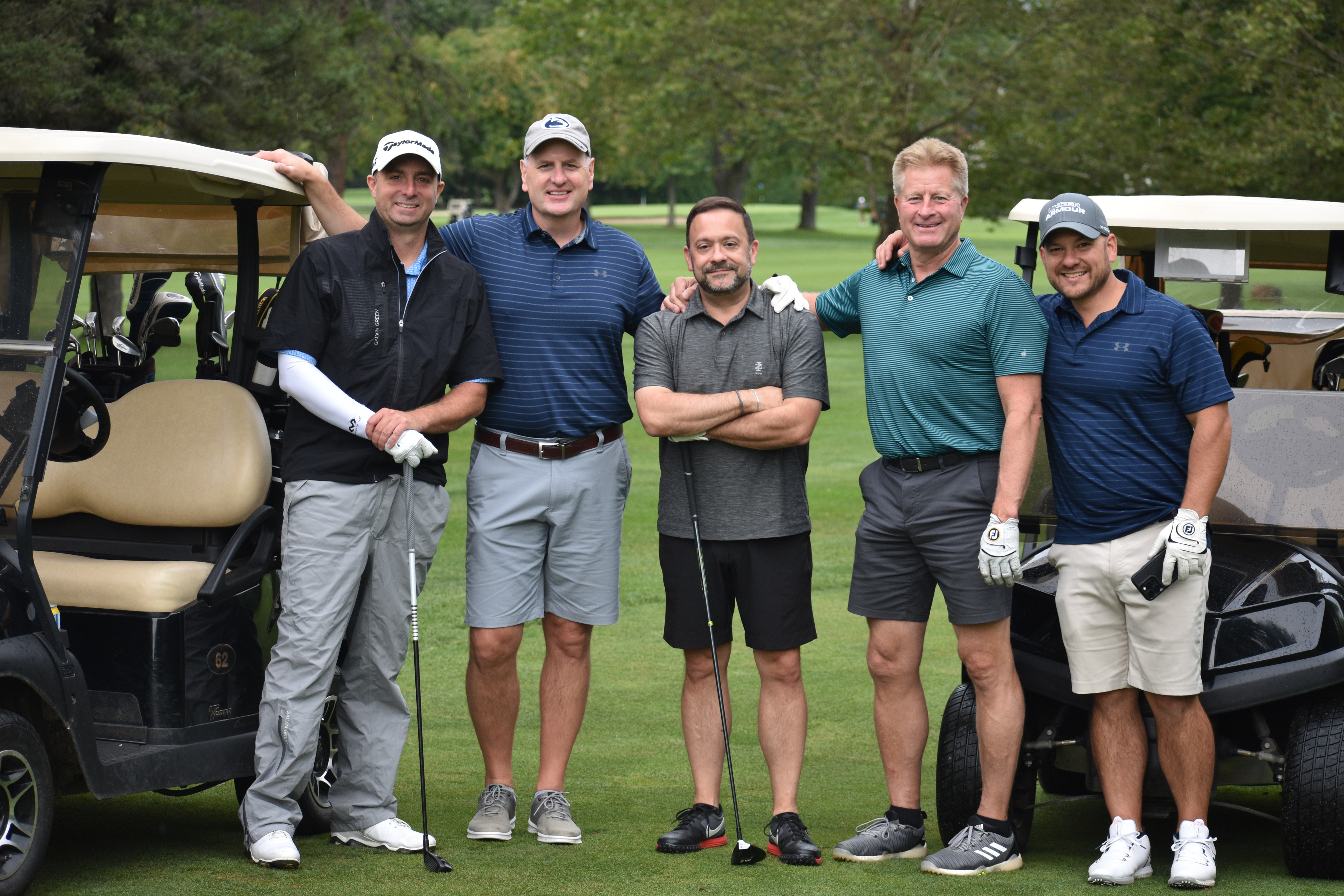 Become a member - a photo of our members on a golf outing