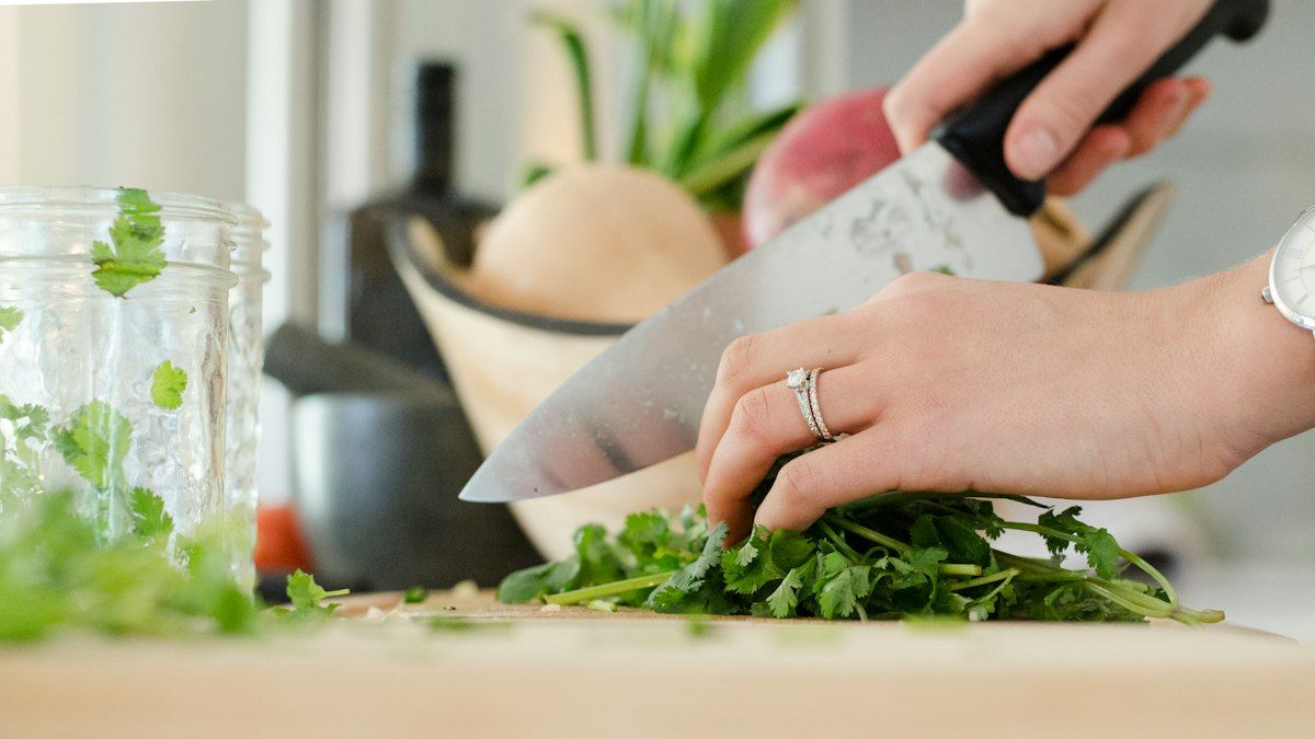 Freshly chopped crisp vegetables on a wooden cutting board ready for fast cooking