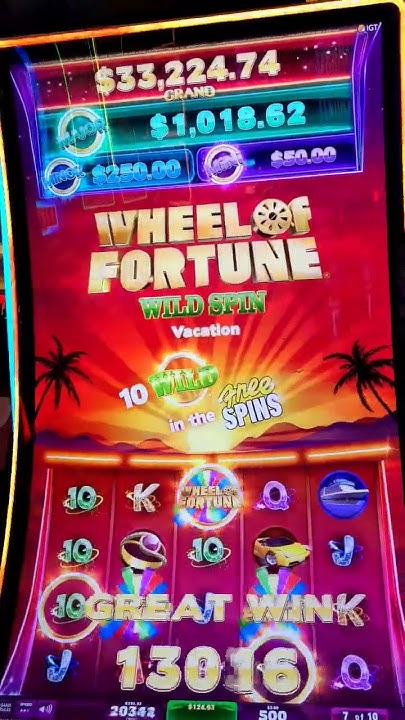 Wheel of Fortune wild spin vacation slot machine