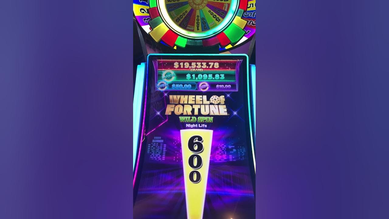 Wheel of Fortune wild spin night life slot machine