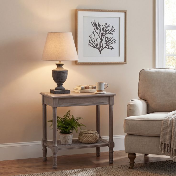 Incia Urn Wooden Table Lamp with grey-washed base and linen shade on a neutral background