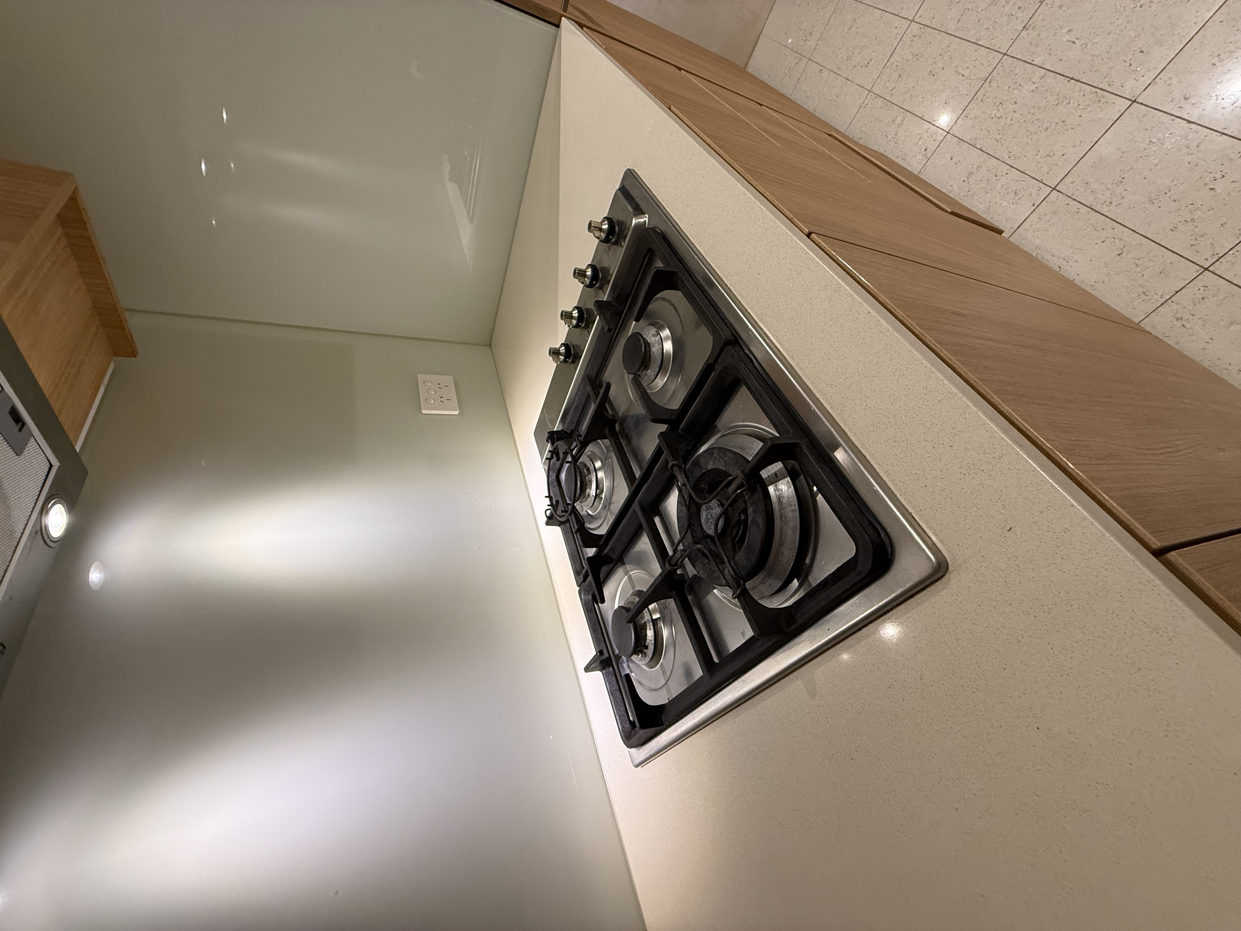 Kitchen cooktop after end of lease clean — spotless
